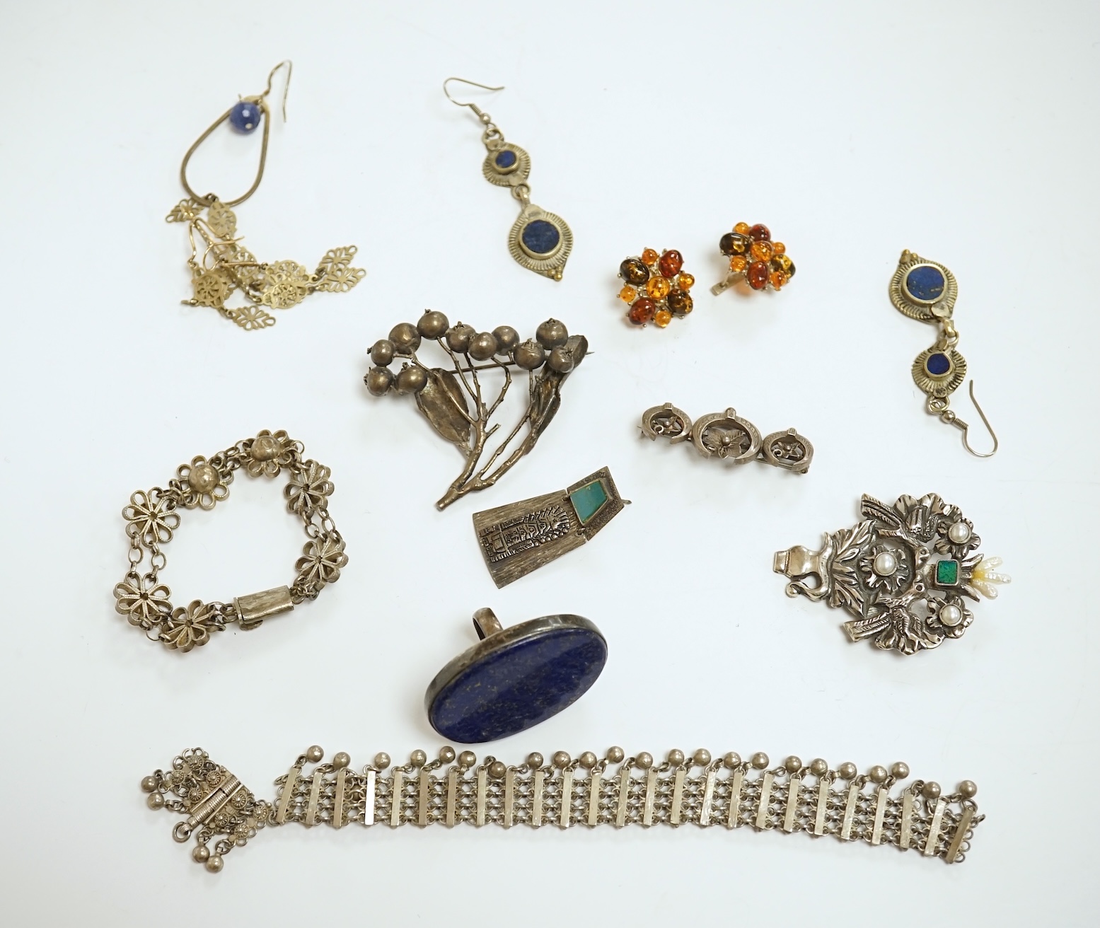 A quantity of assorted early 20th century and later jewellery, including costume, 925 earrings, white metal bangles, rock crystal bracelet, carved jade earrings, lapis lazuli earrings, amethyst earrings, coral branch nec